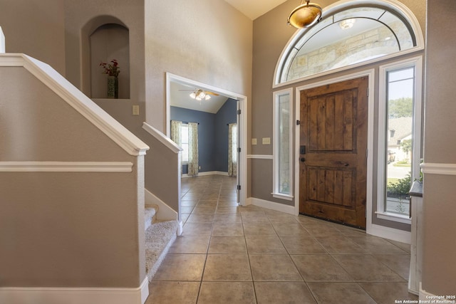 212 Leather Leaf, Boerne, TX 78006 - foyer with tile patterned floors, stairs, and baseboards