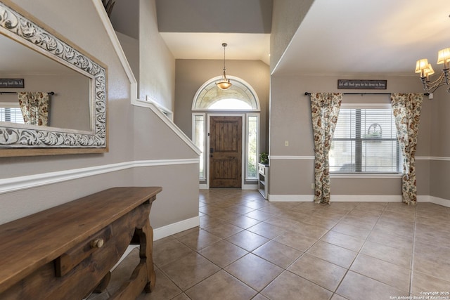 212 Leather Leaf, Boerne, TX 78006 - foyer entrance featuring a chandelier, tile patterned floors, baseboards, and vaulted ceiling