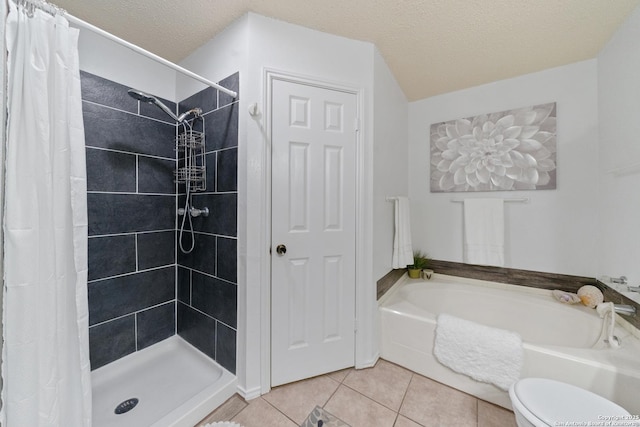 718 Cypressgreen, San Antonio, TX 78245 - bathroom with tile patterned floors, a shower stall, a garden tub, and a textured ceiling