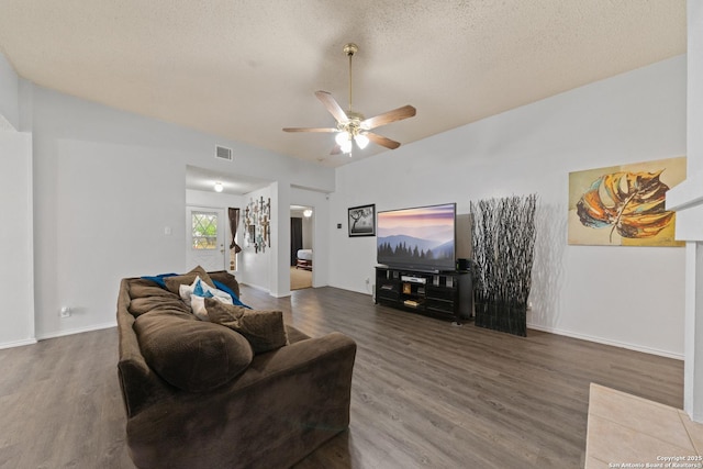 718 Cypressgreen, San Antonio, TX 78245 - living room with wood finished floors, ceiling fan, a textured ceiling, and baseboards