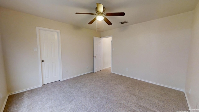 unfurnished bedroom with carpet floors, baseboards, and a ceiling fan
