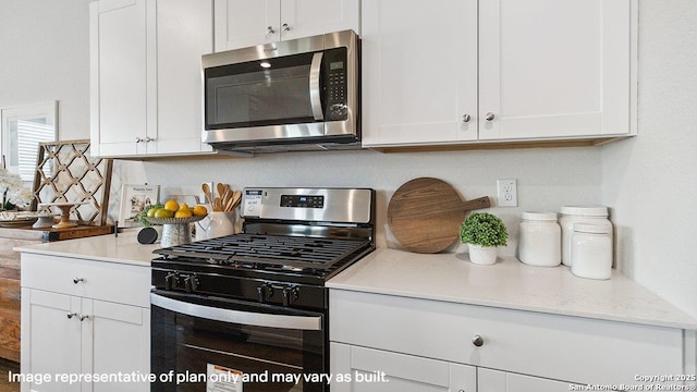 5026 Wichita Pike, San Antonio, TX 78253 - kitchen with stainless steel appliances, white cabinetry, and tasteful backsplash