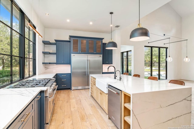 185 Southfield, Boerne, TX 78006 - kitchen featuring open shelves, high end appliances, a sink, healthy amount of natural light, and recessed lighting