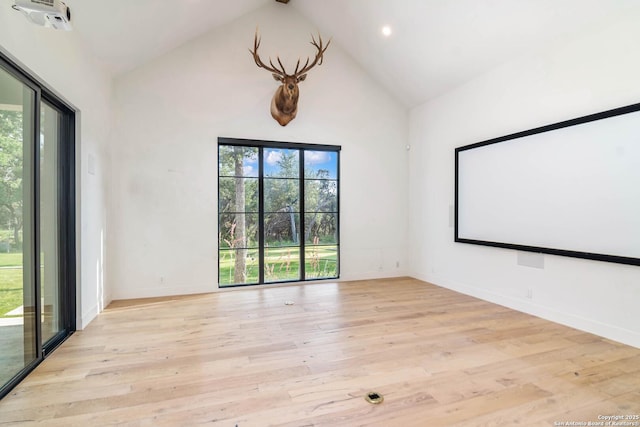 185 Southfield, Boerne, TX 78006 - spare room with high vaulted ceiling, wood finished floors, recessed lighting, and baseboards
