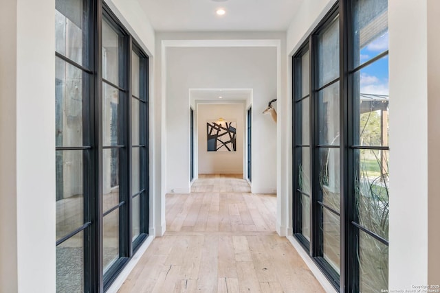 185 Southfield, Boerne, TX 78006 - hallway featuring light wood finished floors, recessed lighting, and baseboards