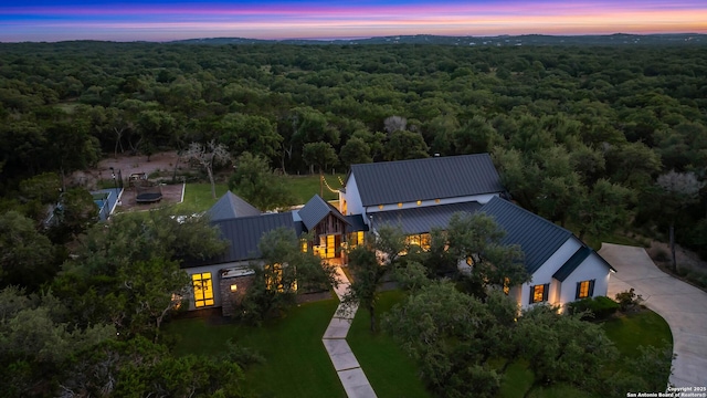 185 Southfield, Boerne, TX 78006 - aerial view at dusk of a wooded view