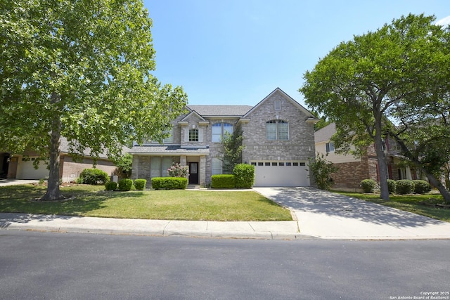 traditional-style house with stone siding, a garage, driveway, and a front lawn