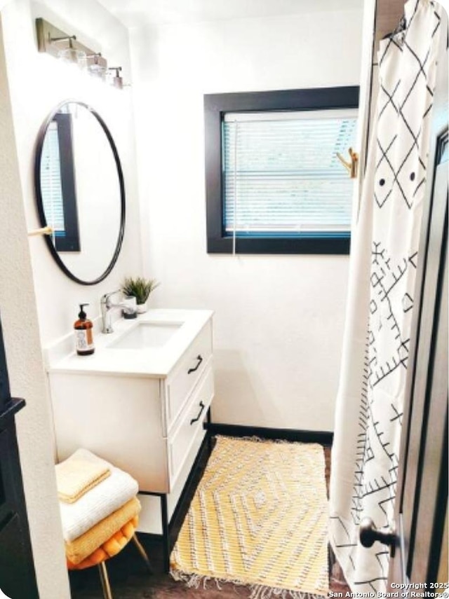 6346 Montgomery, Windcrest, TX 78239 - full bathroom with vanity and baseboards