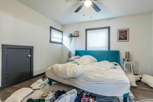 6346 Montgomery, Windcrest, TX 78239 - bedroom featuring wood finished floors and a ceiling fan