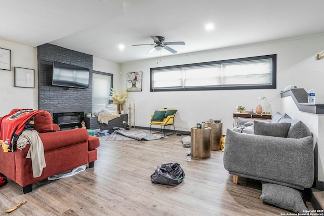 6346 Montgomery, Windcrest, TX 78239 - living area with wood finished floors, a ceiling fan, a fireplace, recessed lighting, and baseboards