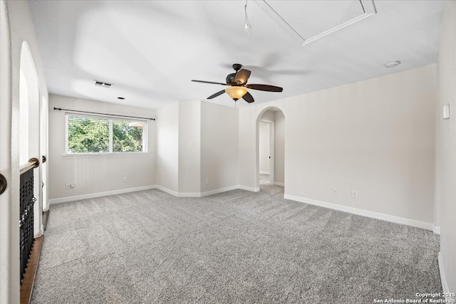 12627 Alamito Crk, San Antonio, TX 78254 - unfurnished living room with attic access, carpet, a ceiling fan, and baseboards