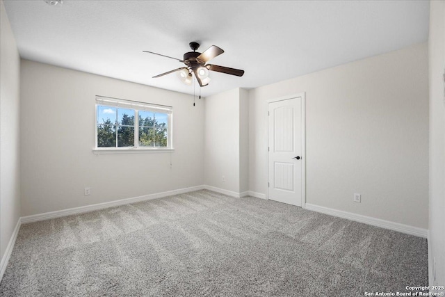 12627 Alamito Crk, San Antonio, TX 78254 - spare room with a ceiling fan, carpet, and baseboards