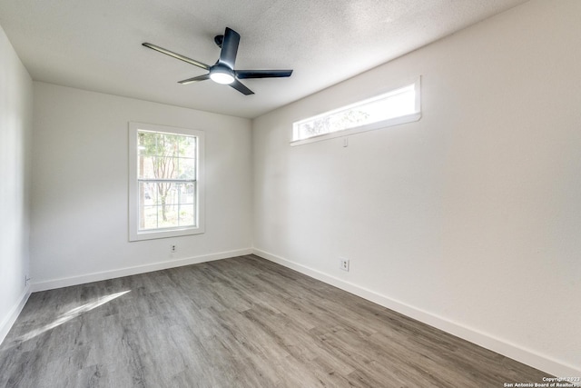 827 Ware Blvd, San Antonio, TX 78214 - empty room with wood finished floors, ceiling fan, and baseboards