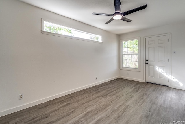 827 Ware Blvd, San Antonio, TX 78214 - empty room with wood finished floors, a ceiling fan, and baseboards