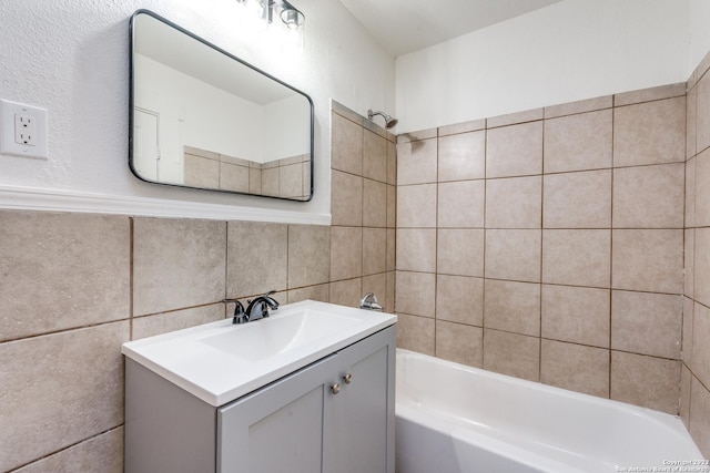 827 Ware Blvd, San Antonio, TX 78214 - full bath featuring  shower combination, tile walls, and vanity