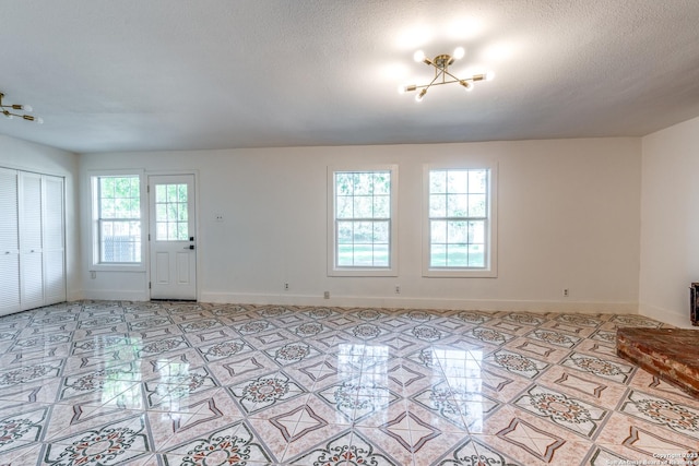 827 Ware Blvd, San Antonio, TX 78214 - unfurnished living room with baseboards