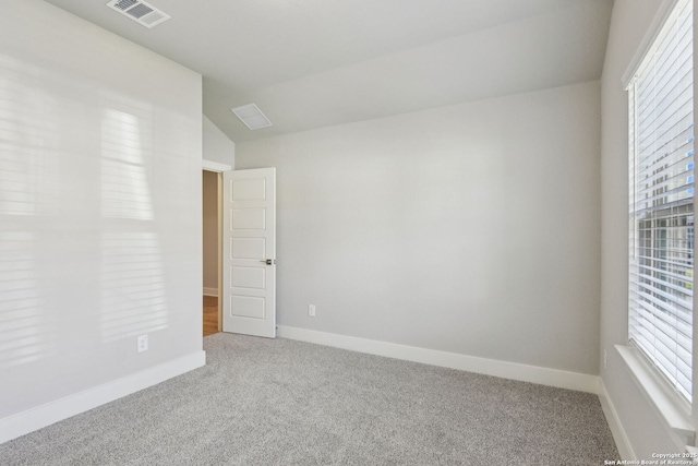12734 Tegea Pass, San Antonio, TX 78245 - carpeted empty room featuring baseboards and vaulted ceiling