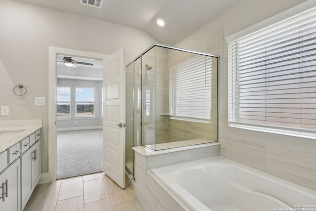12734 Tegea Pass, San Antonio, TX 78245 - bathroom with tile patterned floors, a ceiling fan, a stall shower, vanity, and a garden tub