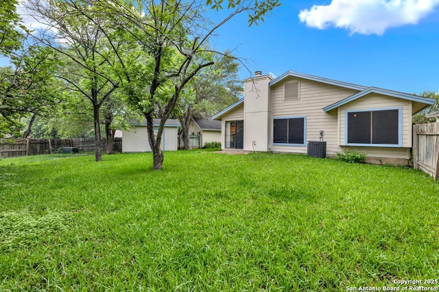 3807 Pine Breeze, San Antonio, TX 78247 - rear view of property with a chimney and cooling unit