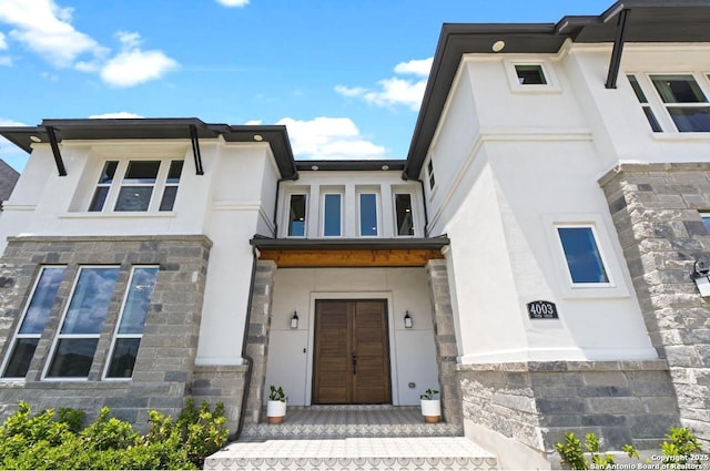 4003 Wood Crk, San Antonio, TX 78257 - view of front of home with stone siding and stucco siding
