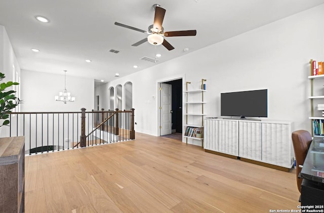 4003 Wood Crk, San Antonio, TX 78257 - living room featuring a ceiling fan, a chandelier, wood finished floors, recessed lighting, and baseboards