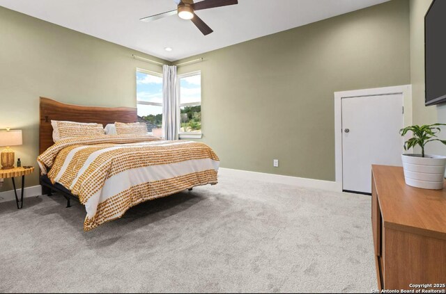 4003 Wood Crk, San Antonio, TX 78257 - carpeted bedroom featuring baseboards and ceiling fan