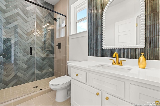 4003 Wood Crk, San Antonio, TX 78257 - bathroom featuring tile patterned flooring, toilet, and a stall shower