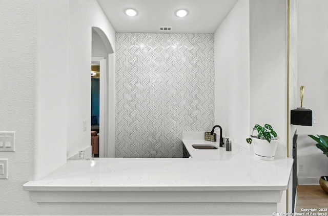 4003 Wood Crk, San Antonio, TX 78257 - bathroom with a sink and recessed lighting