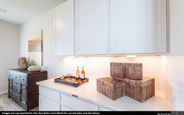 128 Buttercup Aly, San Antonio, TX 78253 - clothes washing area with light wood-style floors
