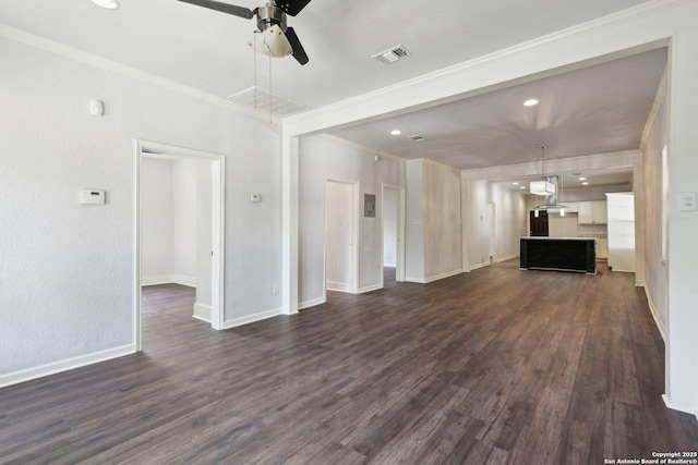 140 E Dullnig, San Antonio, TX 78223 - unfurnished living room featuring crown molding, ceiling fan, dark wood-style floors, baseboards, and recessed lighting