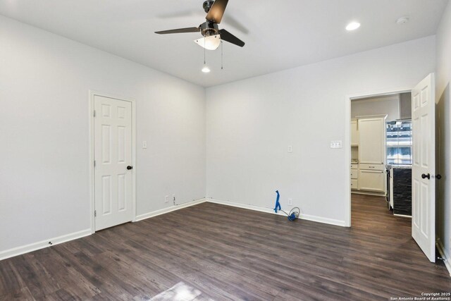 140 E Dullnig, San Antonio, TX 78223 - unfurnished room featuring ceiling fan, dark wood finished floors, baseboards, recessed lighting, and a smoke detector