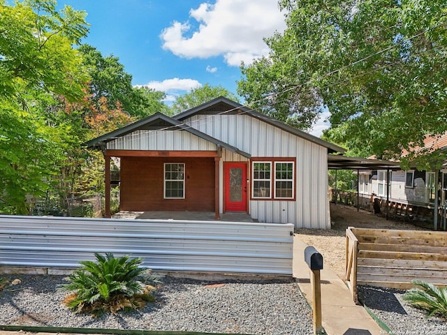 140 E Dullnig, San Antonio, TX 78223 - view of front of house featuring covered porch and board and batten siding