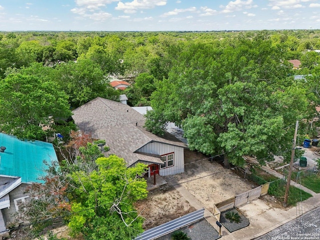 140 E Dullnig, San Antonio, TX 78223 - view of subject property with a heavily wooded area