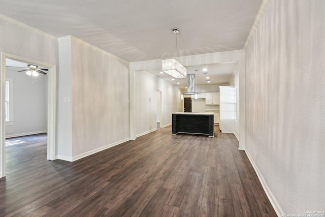 140 E Dullnig, San Antonio, TX 78223 - unfurnished living room featuring dark wood-style floors, ornamental molding, baseboards, and ceiling fan