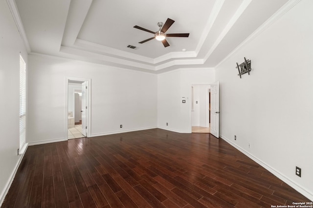 2611 Caravan Cir, San Antonio, TX 78258 - empty room featuring a tray ceiling, ceiling fan, wood finished floors, crown molding, and baseboards