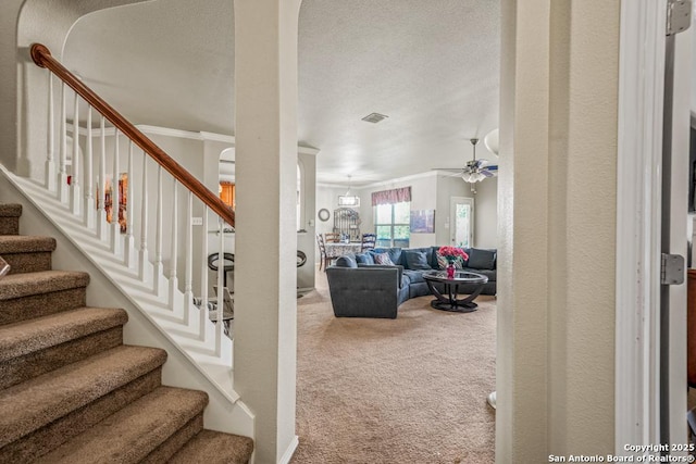 222 Red Quill Nest, San Antonio, TX 78253 - staircase featuring carpet flooring, ornamental molding, and a ceiling fan