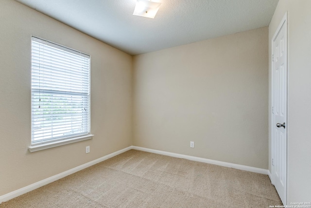 6046 Luckey Run, San Antonio, TX 78252 - unfurnished room featuring light carpet and baseboards