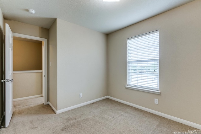 6046 Luckey Run, San Antonio, TX 78252 - unfurnished bedroom featuring carpet and baseboards
