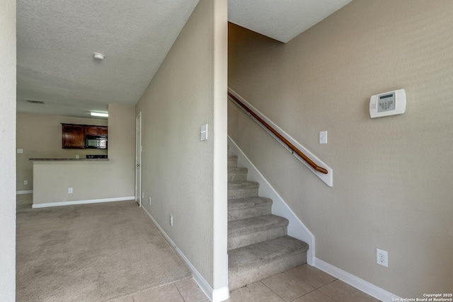 6046 Luckey Run, San Antonio, TX 78252 - stairs featuring baseboards