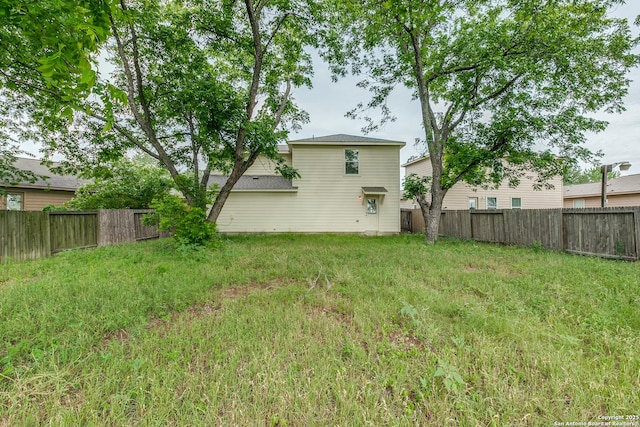 6046 Luckey Run, San Antonio, TX 78252 - rear view of house with a fenced backyard