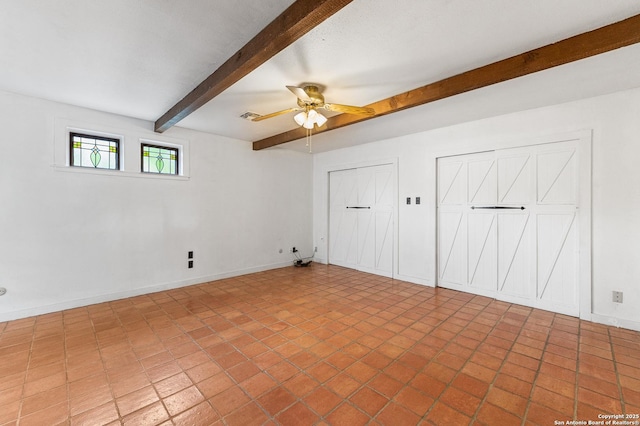 1213 Isabella, Castroville, TX 78009 - empty room with beam ceiling, ceiling fan, and baseboards