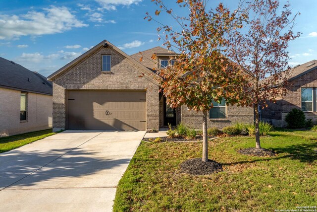 10836 Bango Farms, San Antonio, TX 78254 - traditional-style home featuring brick siding, concrete driveway, a front lawn, and a garage