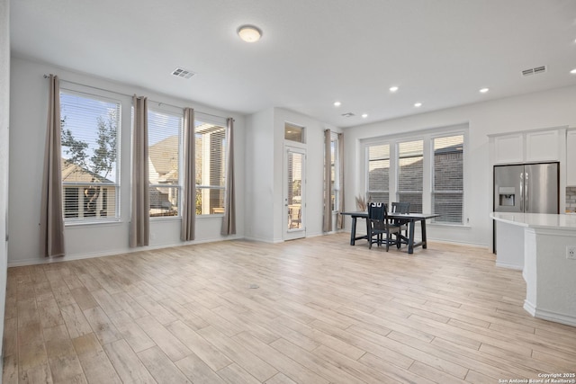 10836 Bango Farms, San Antonio, TX 78254 - living room featuring light wood-type flooring, baseboards, and recessed lighting