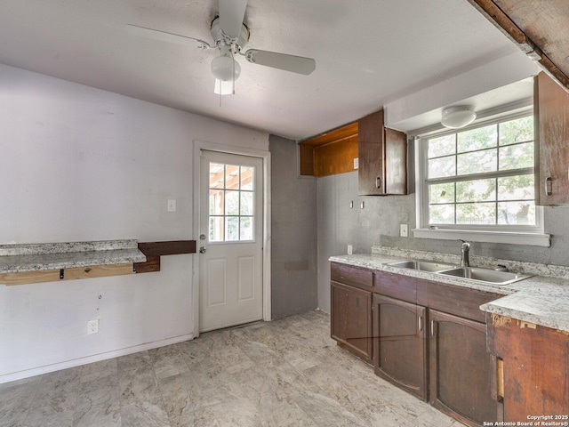4330 Kilrea, San Antonio, TX 78219 - kitchen with a sink, ceiling fan, and light countertops