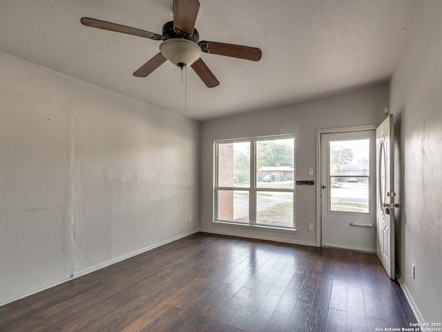 4330 Kilrea, San Antonio, TX 78219 - empty room featuring dark wood-style floors, baseboards, and ceiling fan