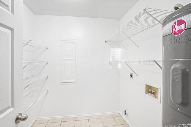 135 Blue Juniper, San Antonio, TX 78253 - laundry area featuring hookup for a washing machine, baseboards, and light tile patterned flooring