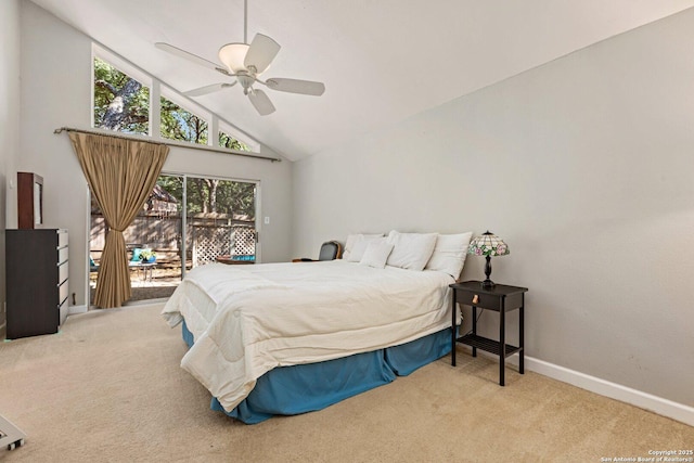 13018 Country Trl, San Antonio, TX 78216 - carpeted bedroom featuring access to exterior, a ceiling fan, baseboards, and high vaulted ceiling