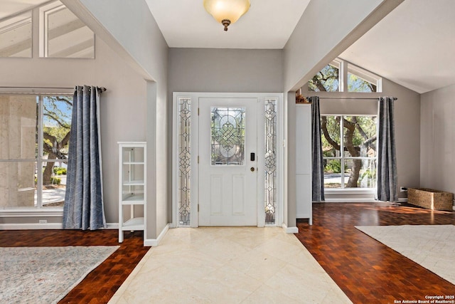 13018 Country Trl, San Antonio, TX 78216 - foyer with vaulted ceiling, baseboards, and wood finished floors
