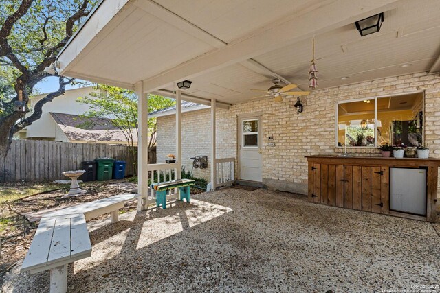 13018 Country Trl, San Antonio, TX 78216 - view of patio / terrace with fence, a ceiling fan, and a sink