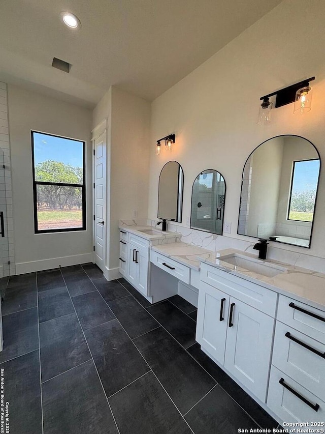 446 Waring Welfare, Boerne, TX 78006 - bathroom with tile patterned floors, vanity, recessed lighting, and baseboards